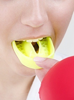 Woman with mouth guard