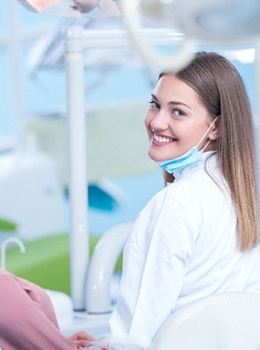 woman visiting Anthem dentist smiling in chair