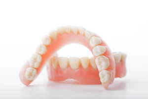 Upper and lower denture